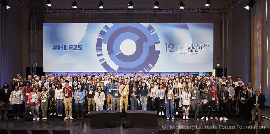 Group photo of attendees onstage at the 12th HLF.